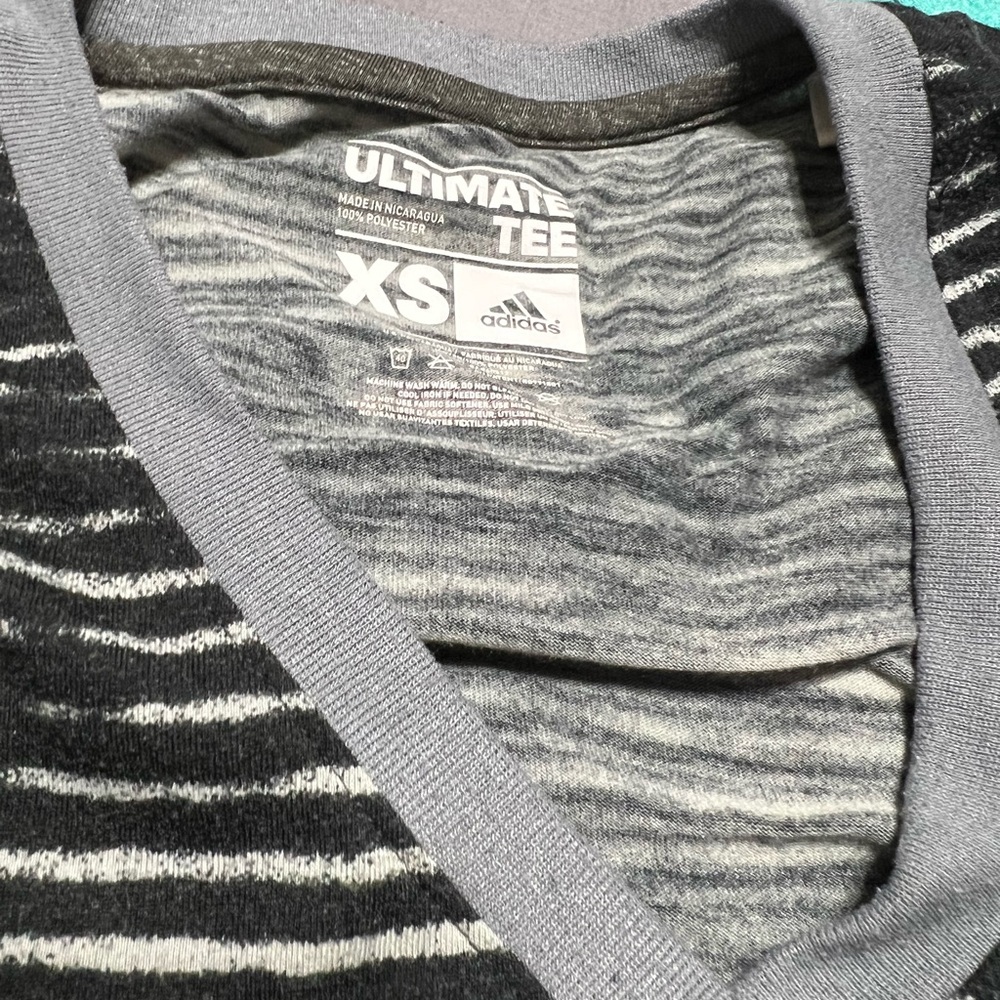 Adidas Women’s Striped Black and Gray V-Neck T shirt and Addias Capris with Pock